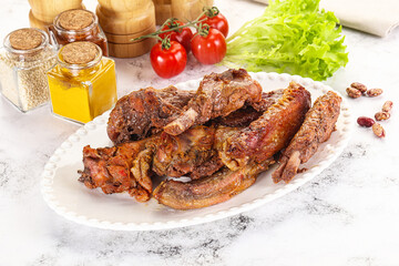 Roasted duck wings with sauce