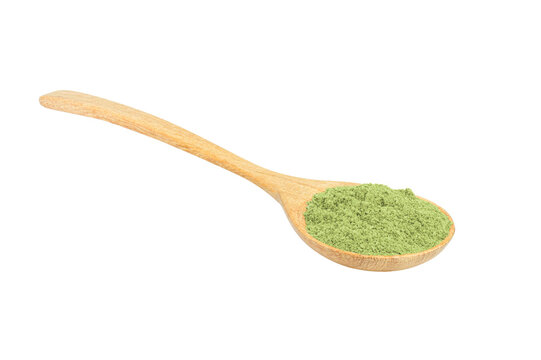 Green powder, Matcha gtrrn tea powder in wooden spoon isolated