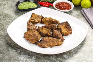 Grilled beef barbecue with spises