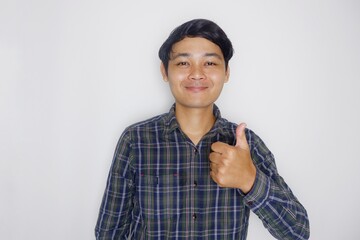 Indonesian men like to wear green shirts with confused, sullen, angry and happy expressions with various random hand movements on a plain white background