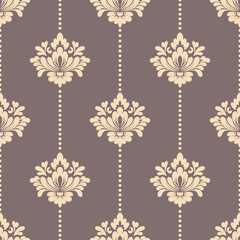 Seamless  damask pattern background. Luxurious classic ornament in baroque style. Golden ornament design for wallpaper, textiles and luxury interior.