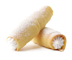 Delicious sweet cannoli filled with creamy ricotta and dusted with powdered sugar during a dessert...