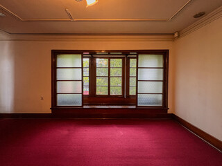 A collection of various exterior windows on buildings, showcasing diverse architectural styles and materials.