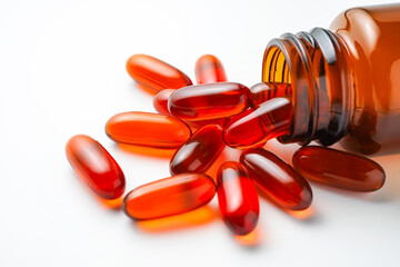 Vitamin capsules in a bottle, soft gels, Fish oil capsules, omega 3, omega 9, vitamin D, vitamin E