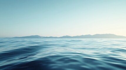 Obraz premium Serene Scene of Calm Waters Reflecting Soft Light Under the Clear Sky with Distant Mountains Creating a Peaceful Atmosphere for Relaxation