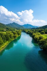 Obraz premium Serene River Surrounded by Lush Green Mountains