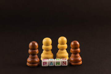 A group of chess PAWN, ready for the challenge. The word 