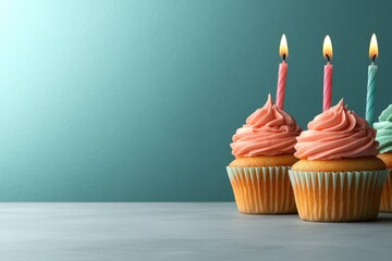 Colorful Cupcakes with Candles Celebrating a Festive Occasion on a Soft Background