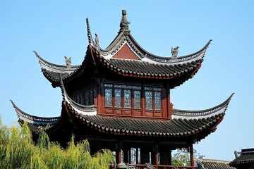 Obraz premium Traditional Chinese Architecture Shows Intricate Roof Design with Ornamental Details and Historical Charm.