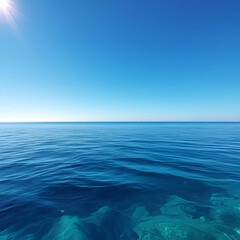 Obraz premium Immerse yourself in the timeless beauty of the ocean under a clear sky. This stunning image captures the deep blue waters stretching endlessly to the horizon
