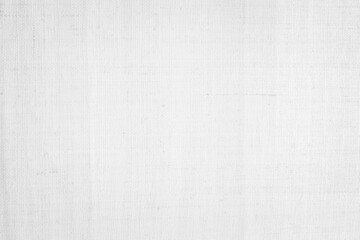 White color fabric canvas woven texture background in pattern light blank. Natural gauze linen, carpet wool and cotton cloth textile textured as clean empty for decoration text. Grey sack material.