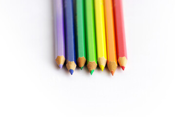 colored pencils on white background