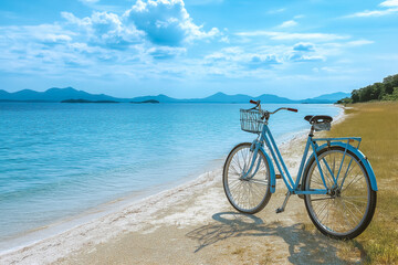 Obraz premium A bike parked near a beach with the ocean in the background