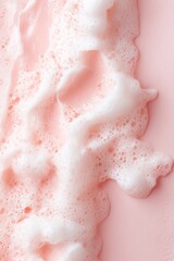 This soft watercolor texture features gentle pink hues that fade into a clean white area, providing an artistic and delicate background ideal for creative text placement and design