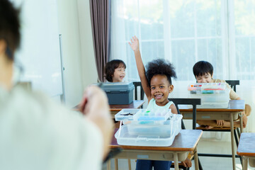 Group of diverse children enjoy learning about the STEM.
