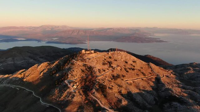 Mount Pantokrator Corfu top mountain summit Greece aerial 4k video. Peak communications technology station.