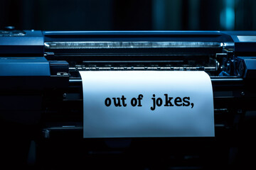 Large format printer printing the sentence out of jokes on a sheet of paper, conveying a message of humor and creativity