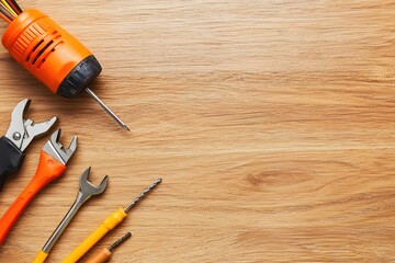 Handyman Tools on Light Wood Background Workspace
