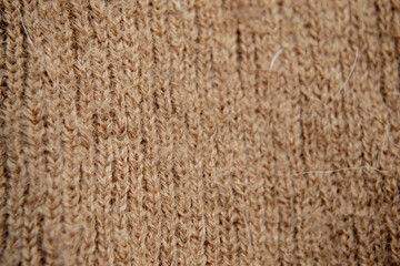 Brown wool knitted texture plaid fabric, close up view