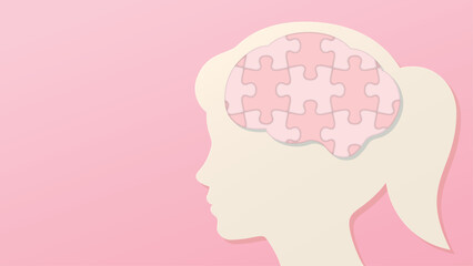 ピンクのパズルのピースでできた脳の女の子の横顔のイラスト　ピンク背景