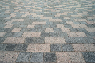 Perspective block pavement or herringbone brick tile floor walkway. Perspective concrete block pavement. City sidewalk block or the pattern of stone block paving.
