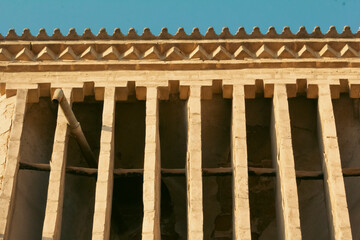 Fototapeta premium Details of the ornamental brick work designs on a wind-catching tower in Yazd, Iran. 
