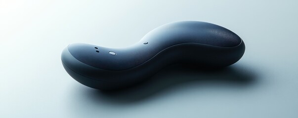 Obraz premium Sleek curved device on pale blue background, product shot