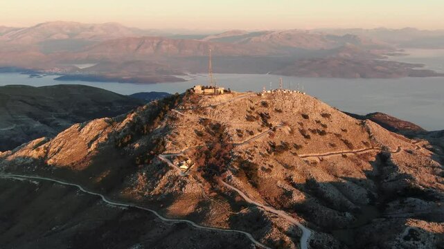 Mount Pantokrator Corfu top mountain summit Greece aerial 4k video. Peak communications technology station.