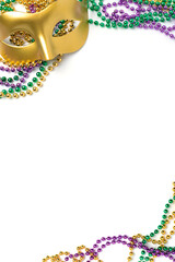 Mardi gras beads and mask isolated on white background © Anna