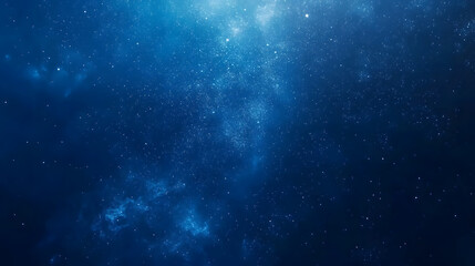 Fototapeta premium A sparkling blue galaxy scene, filled with stars and cosmic dust.