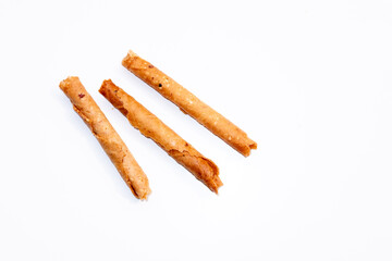 Crispy egg rolls, a popular Indonesian snack, perfect for Hari Raya celebrations. These sweet treats, known as 