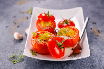 baked tomato stuffed with egg