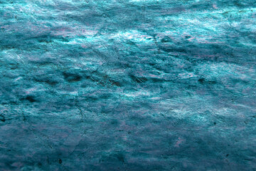 art background of pink stains on blue with a metallic effect