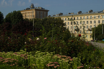 Stalinist apartment buildings in a green park