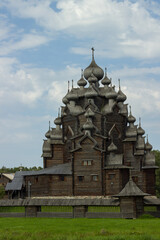 Historical wooden church made of logs in Bogoslovka