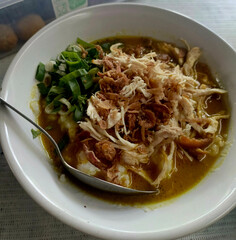 bubur ayam indonesian breakfast food. closeup Very delicious chicken porridge. Semarang-Central Java. 01-06-2025