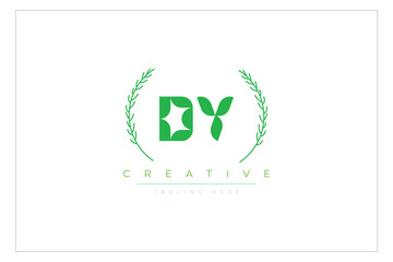 DY letters eco logo with leaf. Fresh nature and healthy leaf logo design.