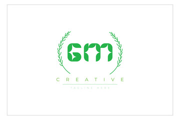 GM letters eco logo with leaf. Fresh nature and healthy leaf logo design.