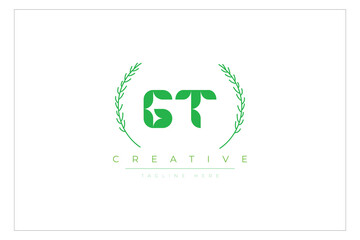 GT letters eco logo with leaf. Fresh nature and healthy leaf logo design.