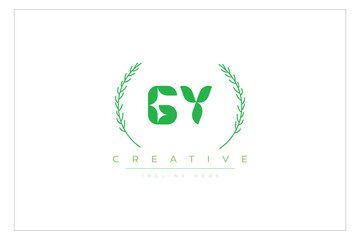GY letters eco logo with leaf. Fresh nature and healthy leaf logo design.