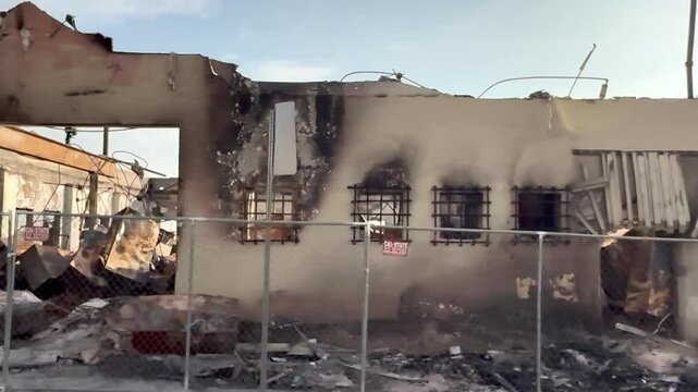 Street View Shot Of A Burnt Building From The Eaton Wildfire At Altadena In Los Angeles, California.