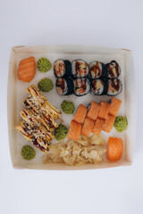Stunning Sushi Platter Featuring Rolls, Sashimi, and Assorted Garnishes