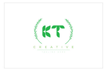 KT letters eco logo with leaf. Fresh nature and healthy leaf logo design.