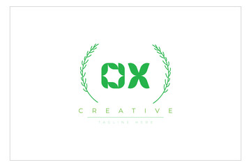 OX letters eco logo with leaf. Fresh nature and healthy leaf logo design.