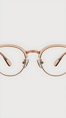 Stylish eyeglasses with a rose gold frame, showcasing a modern design. Perfect for adding a chic touch to any outfit, combining elegance and functionality.