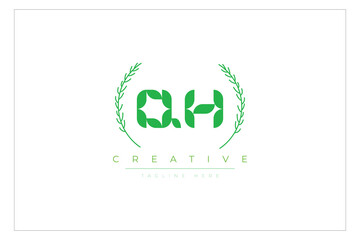 QH letters eco logo with leaf. Fresh nature and healthy leaf logo design.