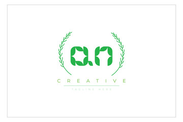 QN letters eco logo with leaf. Fresh nature and healthy leaf logo design.