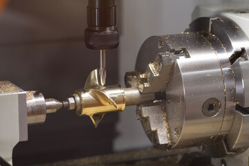Processing parts on a modern lathe. Metal processing
