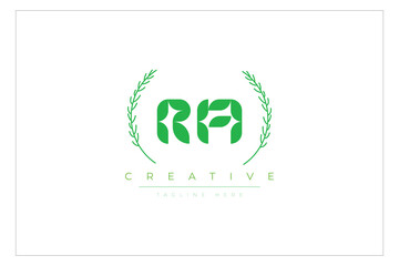 RA letters eco logo with leaf. Fresh nature and healthy leaf logo design.