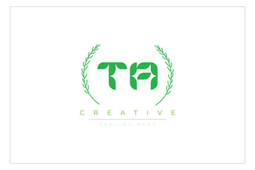 TA letters eco logo with leaf. Fresh nature and healthy leaf logo design.